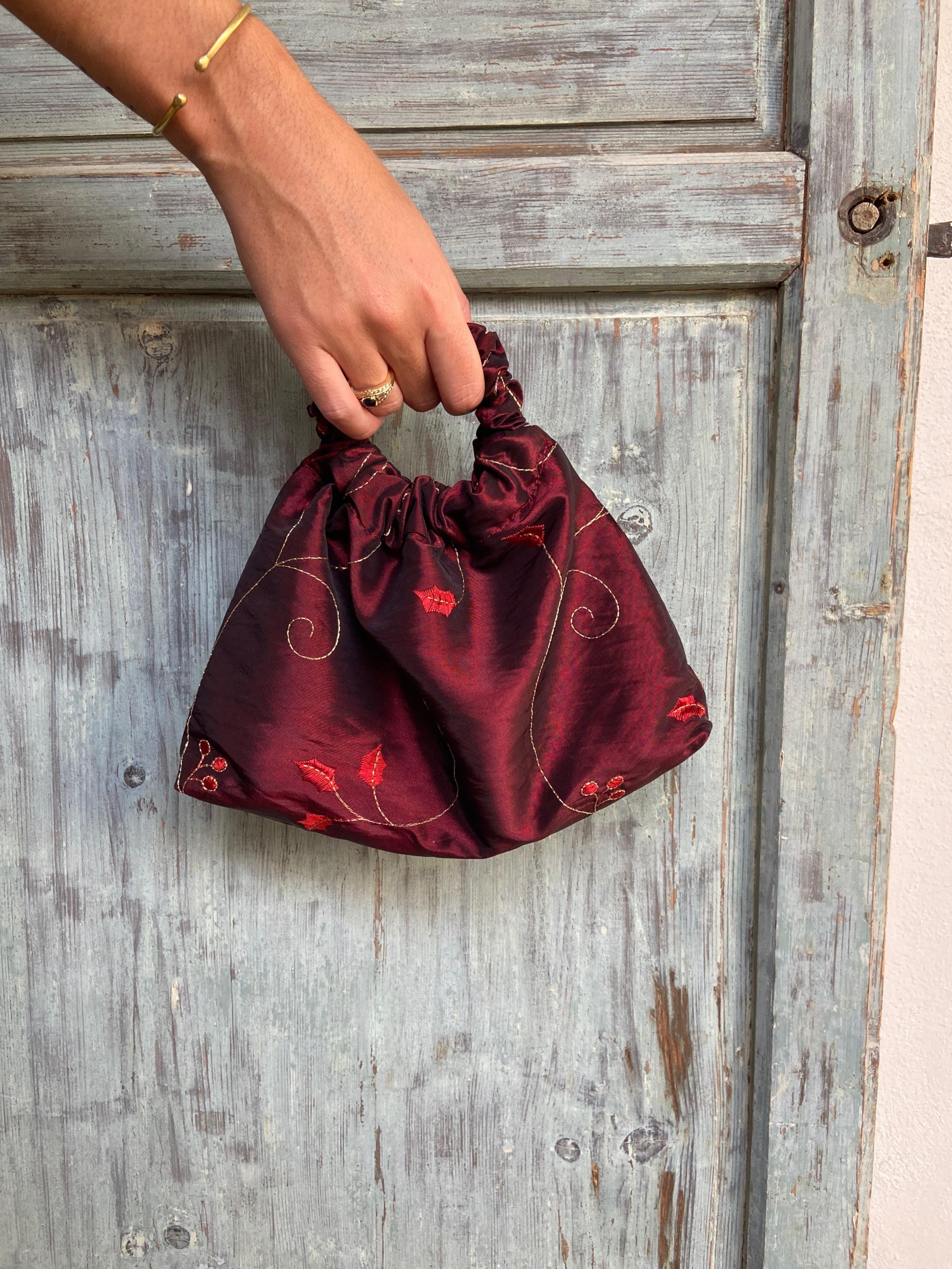 Bolso flores burdeos